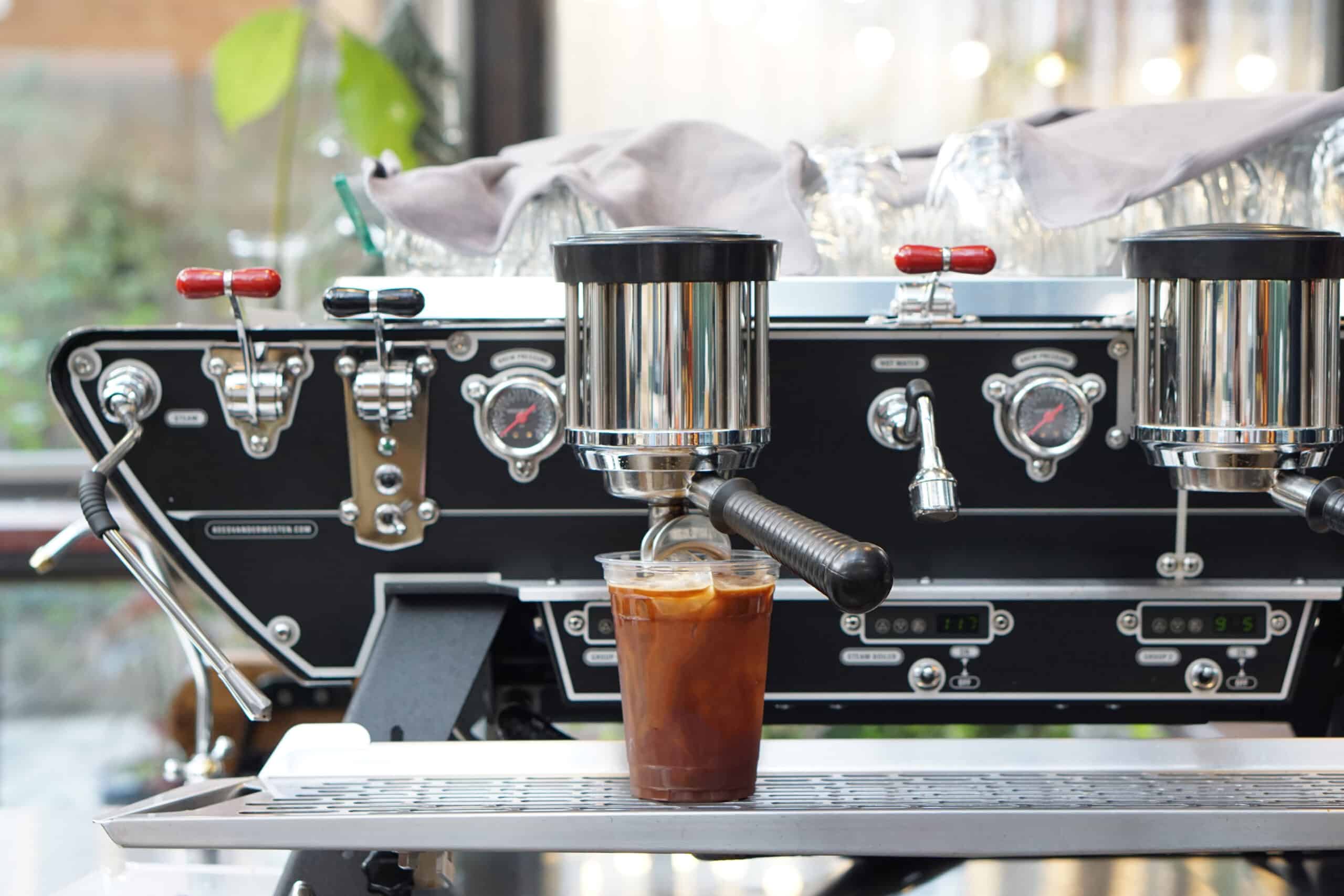 Iced,Americano,-,Coffee,Machine,Pours,Espresso,Shot,Into,A